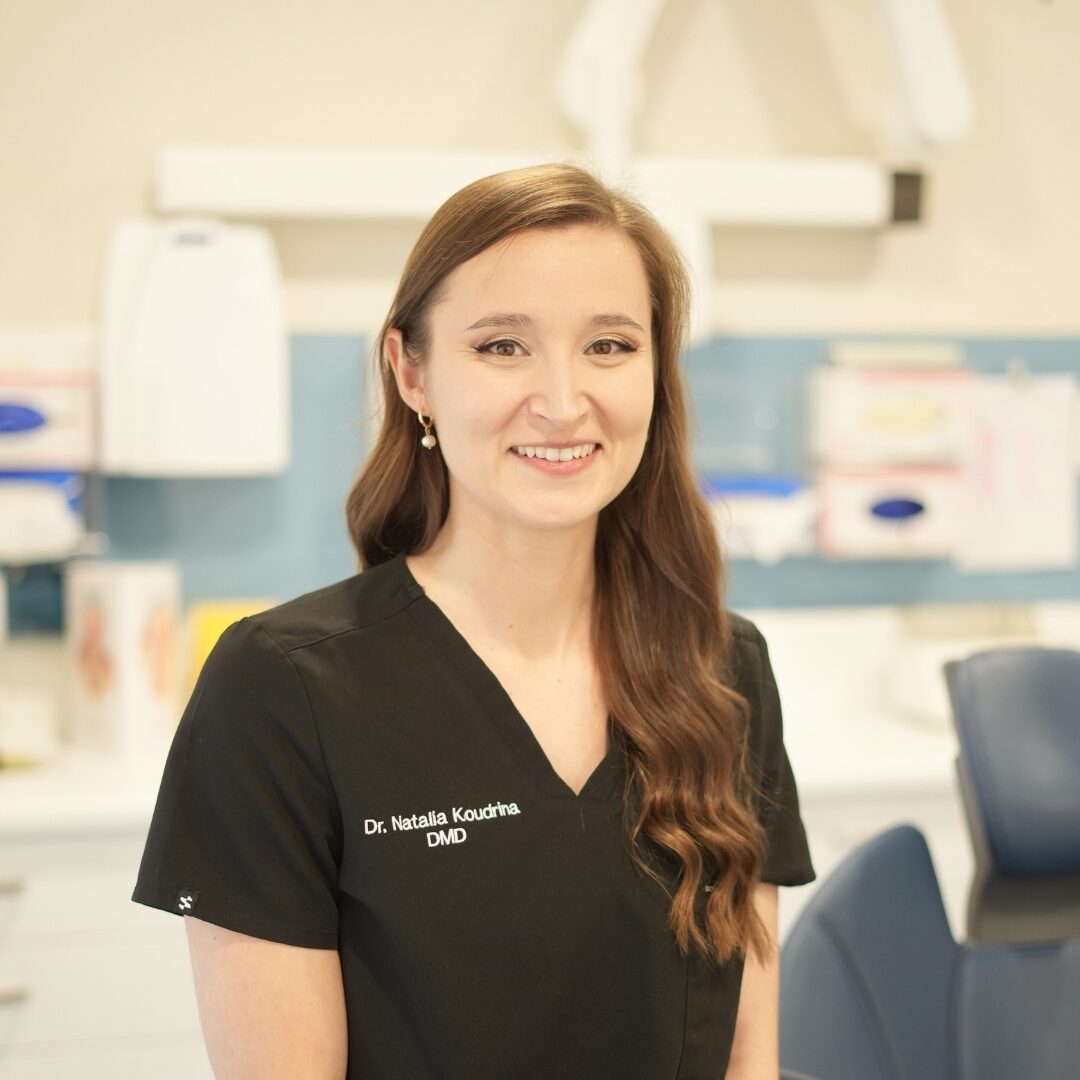 A dentist smiling in the surgery at Australind Dental Centre